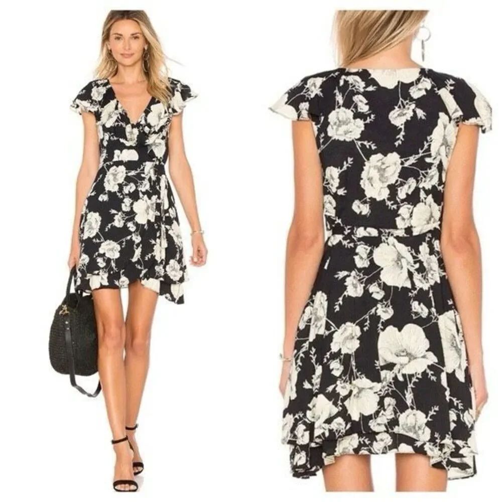 Free People French Quarter Wrap Mini Dress in the black floral print size XS